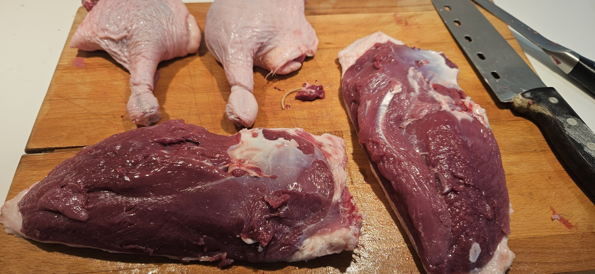The breasts and legs are removed cleanly, while the carcass and bones are kept for stock.