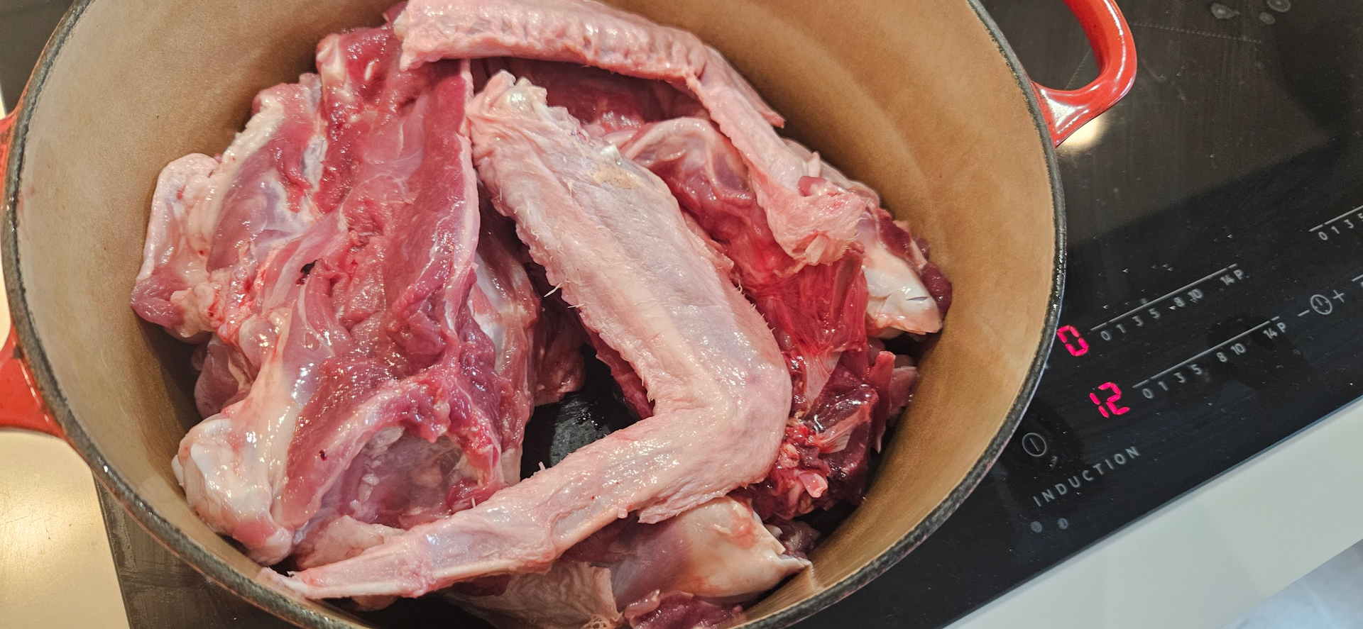 Lay duck skin and fat skin-side down over the carcass to render fat first, then add water and turn the rest into stock.
